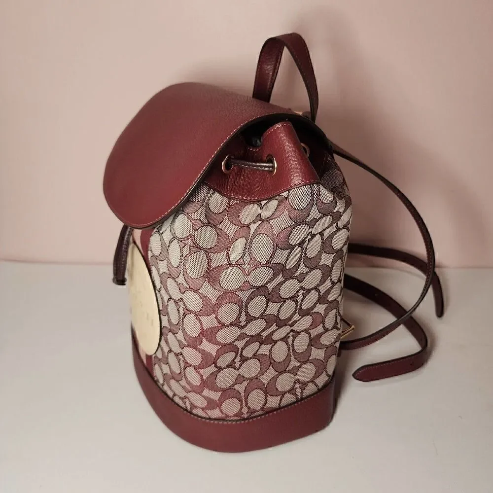 NWT Coach CE601 Dempsey Drawstring Backpack In Signature Jacquard Wine